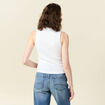 Polo sans manches blanc femme