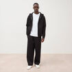 Pantalon coupe loose noir homme
