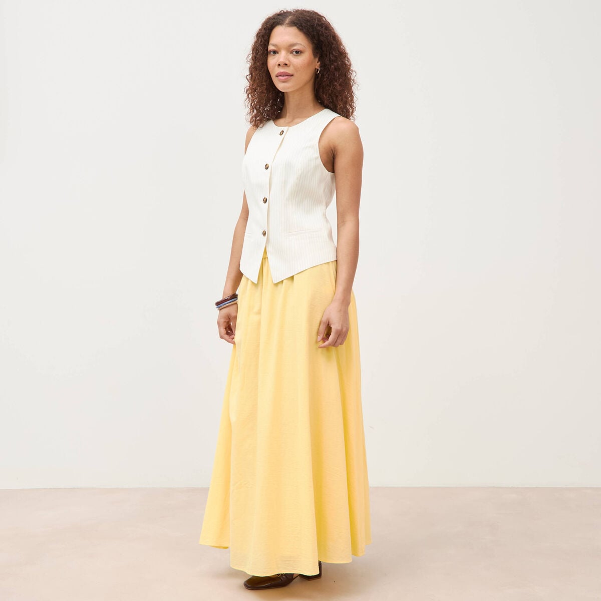 Gilet sans manches col rond doubl&eacute; ivoire femme