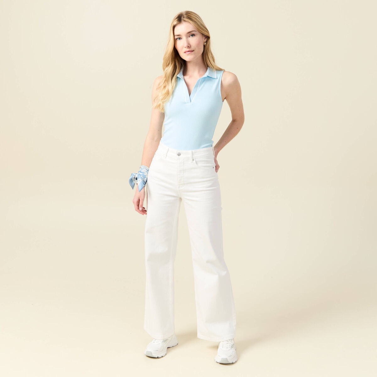Polo sans manches bleu pastel femme