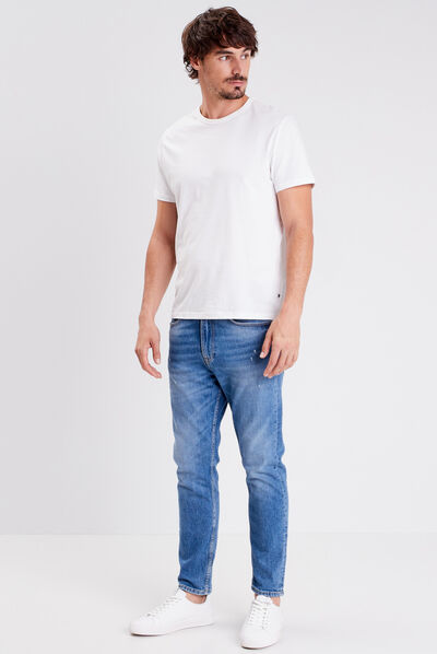 Jeans tapered détails destroy denim stone homme