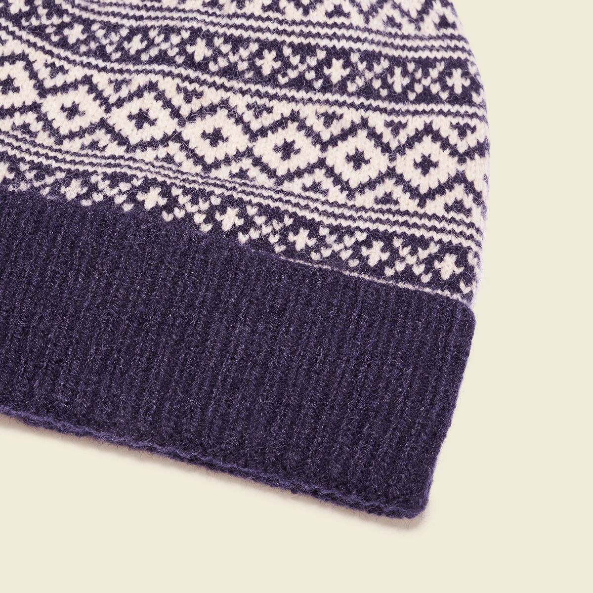 Bonnet à pompon bleu marine homme