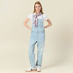 Salopette droite en jean denim used femme