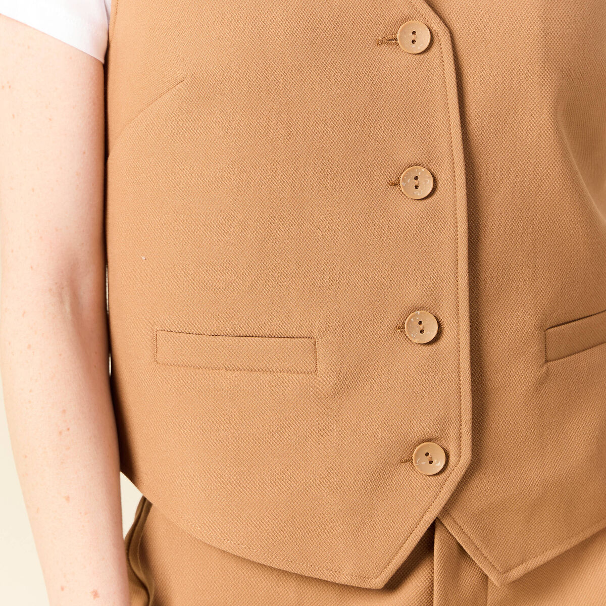 Gilet ajust&eacute; sans manches doubl&eacute; beige femme
