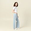 Polo zippé manches courtes blanc femme