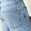 Jeans large longueur 32 en coton denim bleach homme