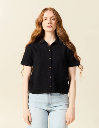 Polo en maille noir femme
