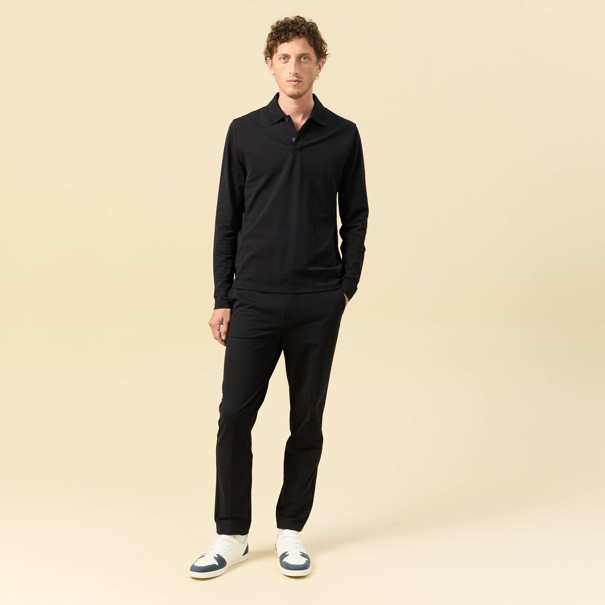 Polo cintr&eacute; manches longues noir homme