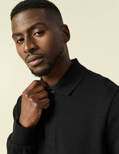 Polo cintr&eacute; manches longues en coton noir homme