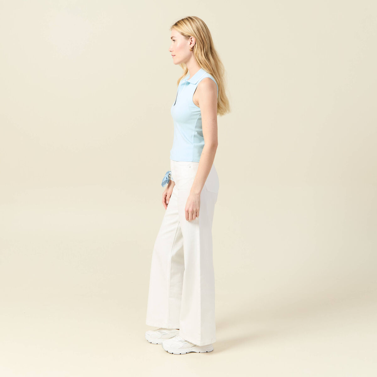 Polo sans manches bleu pastel femme