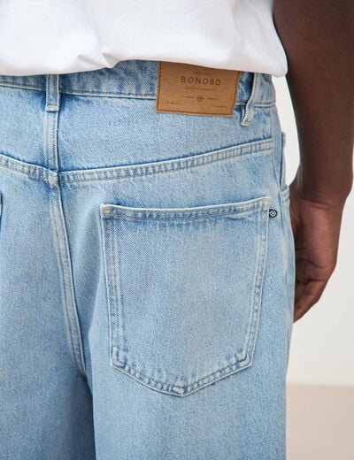 Jeans large longueur 32 en coton denim bleach homme