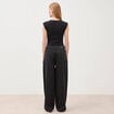 Body ajust&eacute; col rond manches d&eacute;bardeur noir femme