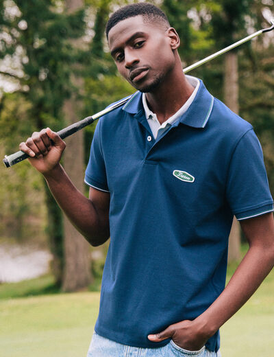 Polo cintr&eacute; en coton manches courtes bleu marine homme