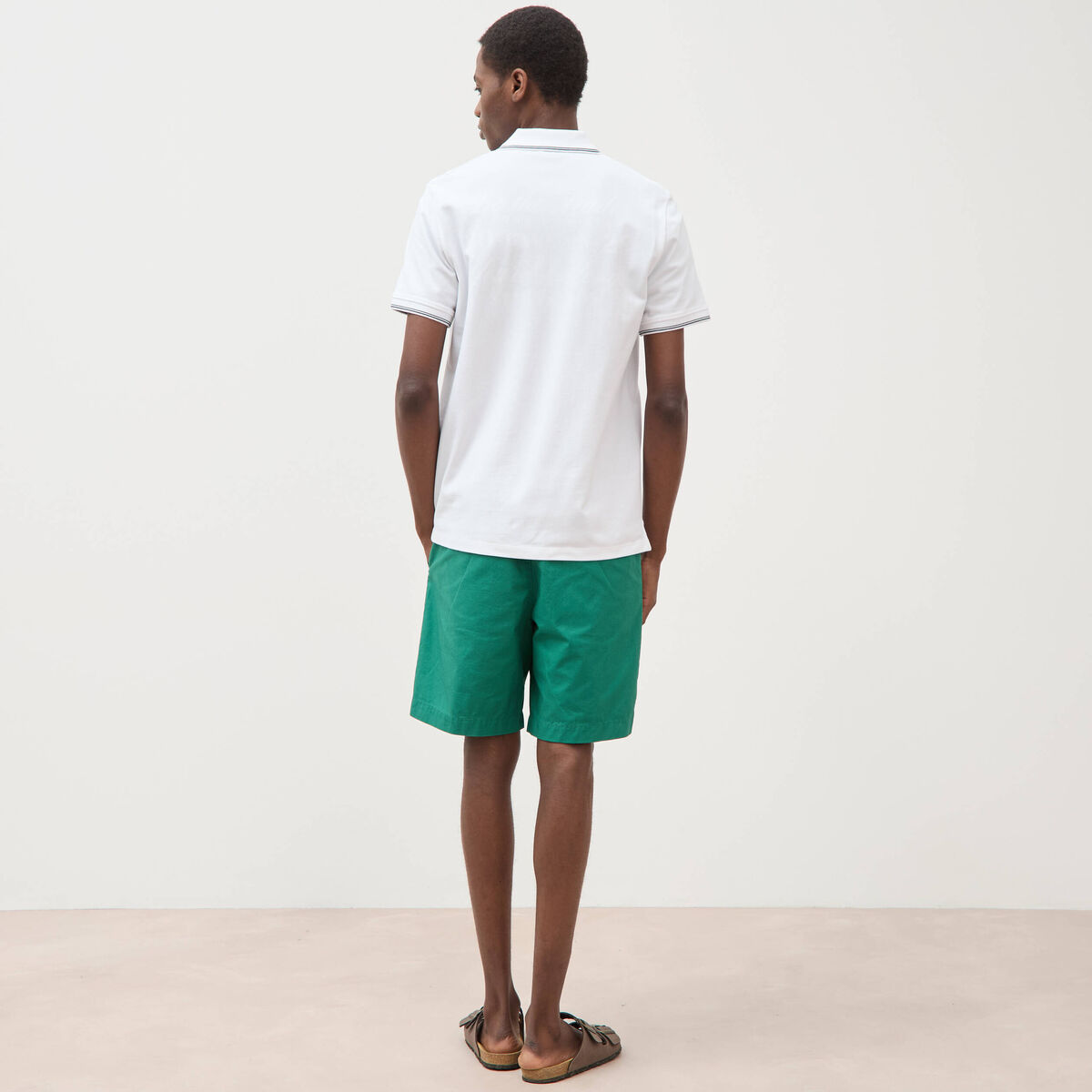 Polo cintr&eacute; en coton manches courtes blanc homme