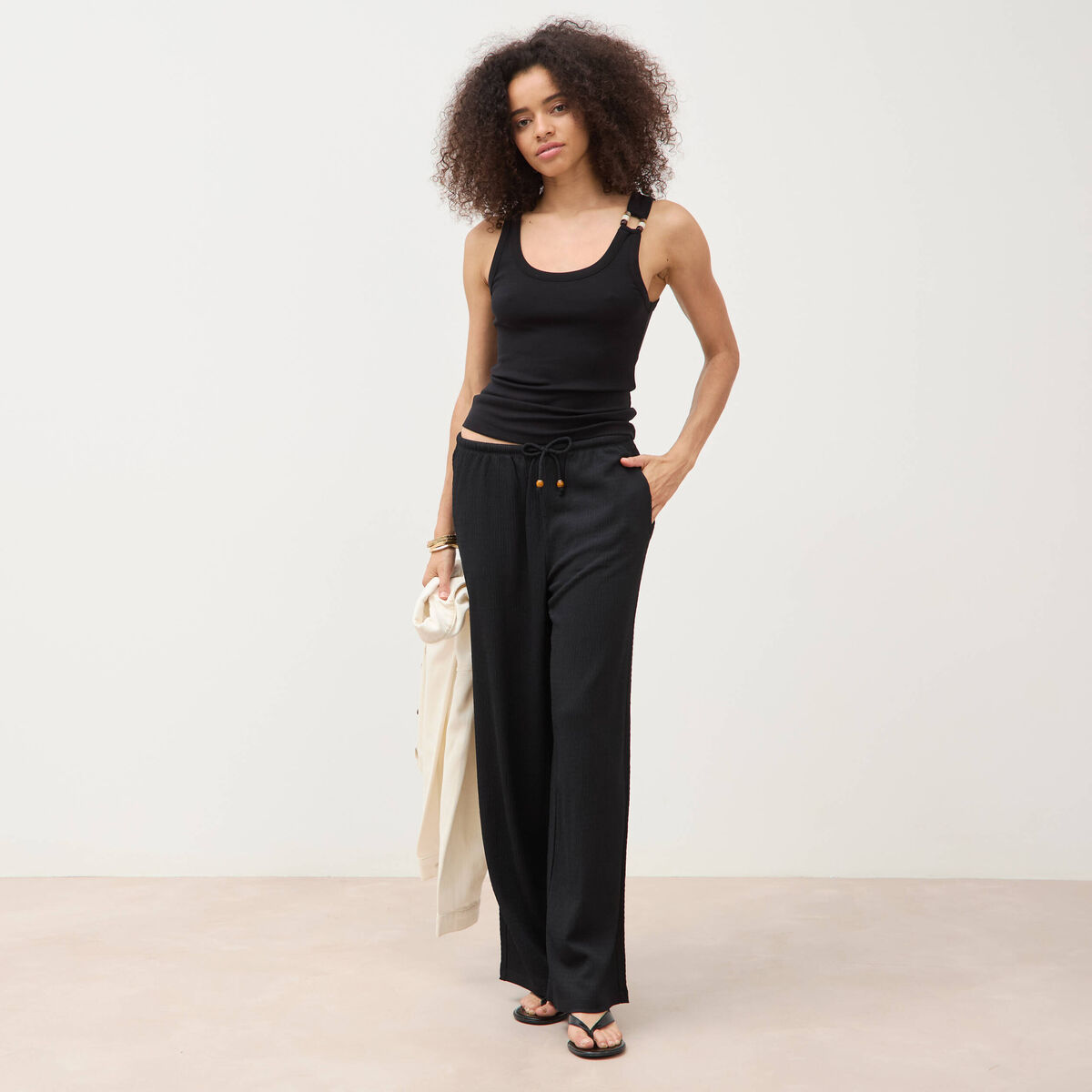 D&eacute;bardeur sans manches noir femme
