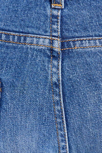 Jeans tapered détails destroy denim stone homme