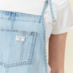 Salopette droite en jean denim used femme
