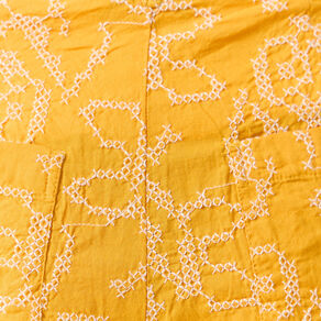 Pantalon large brodé jaune femme