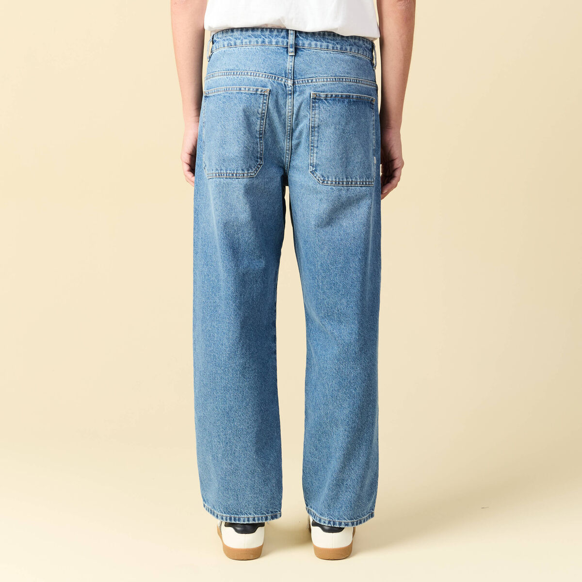Jeans loose longueur 32 en coton denim bleach homme