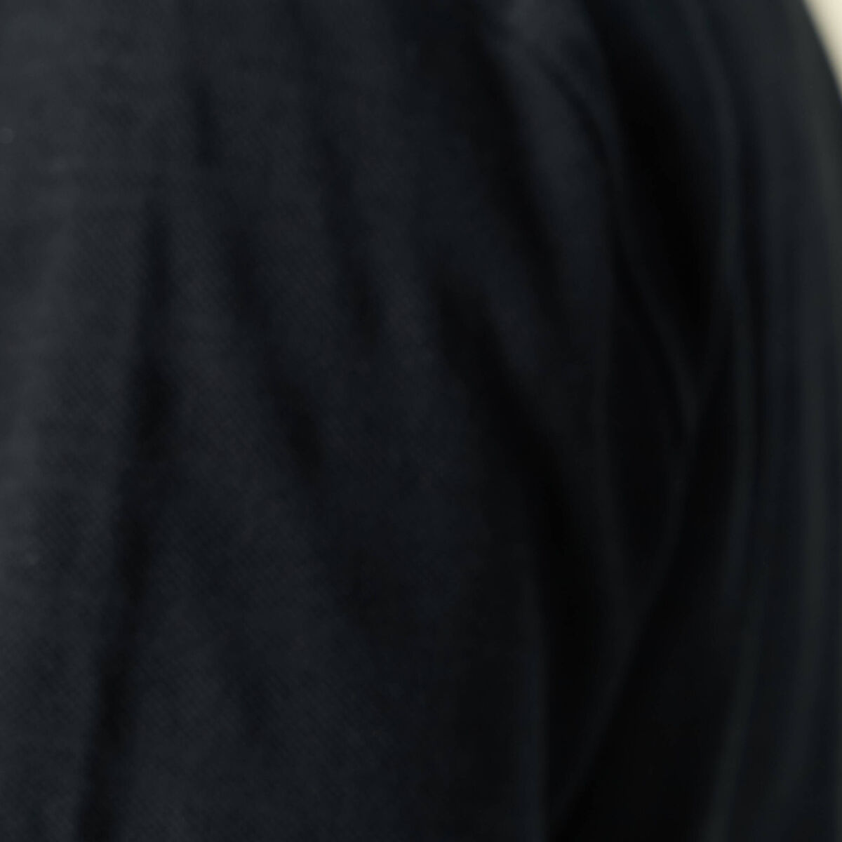 Polo cintr&eacute; manches longues en coton noir homme