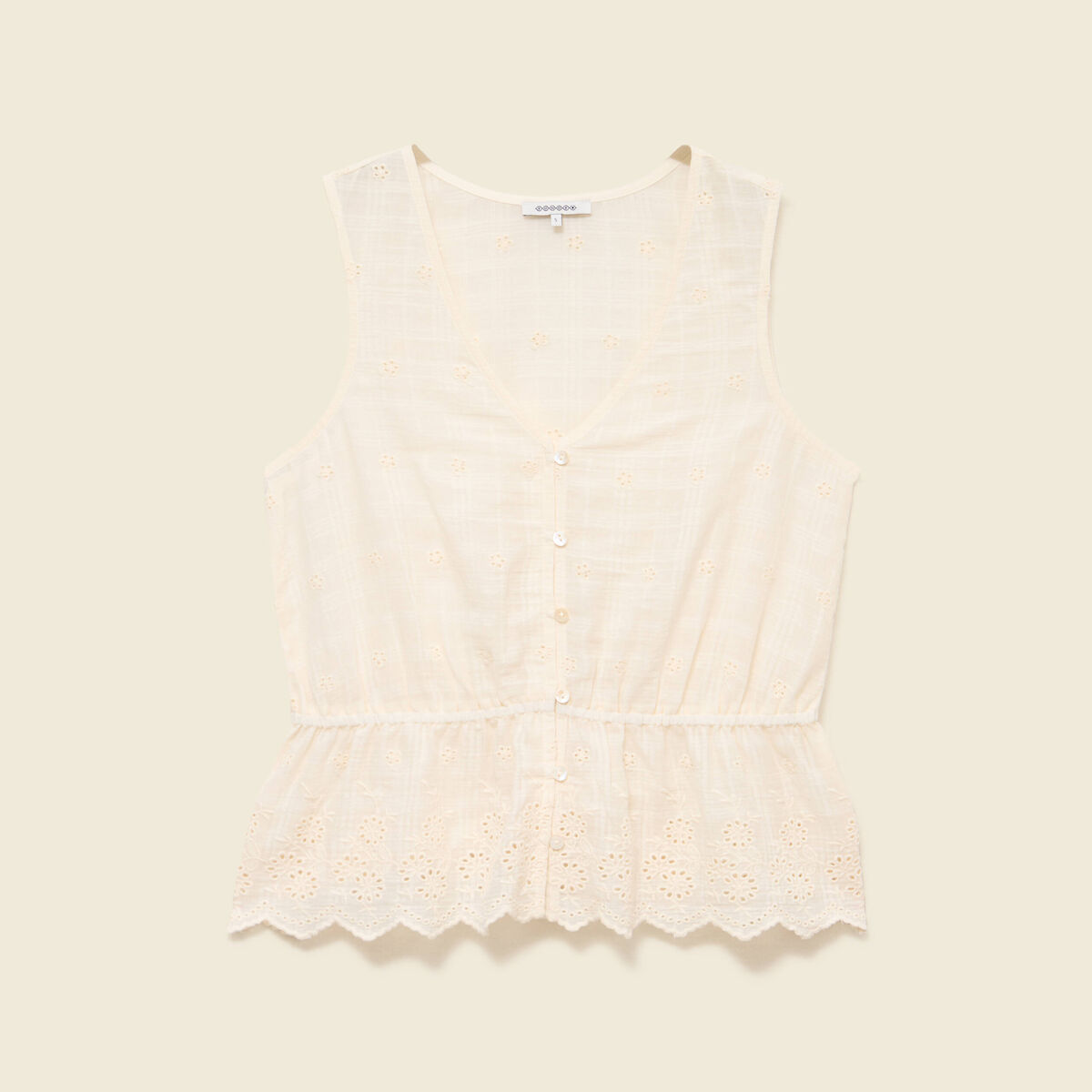 Top col v sans manches en coton creme femme