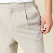 Pantalon chino large à pinces beige homme