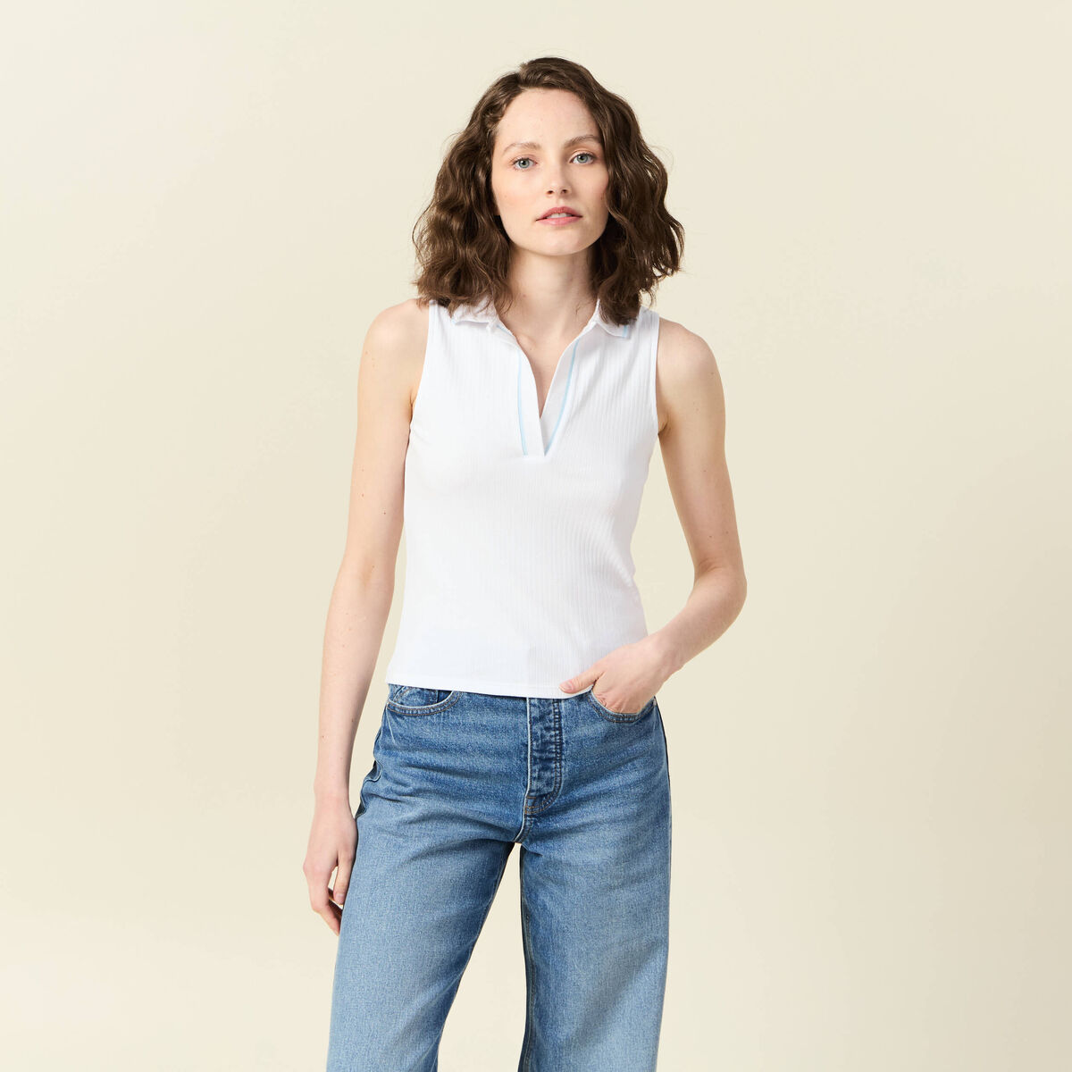 Polo sans manches blanc femme