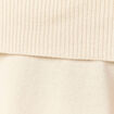 D&eacute;bardeur tricot sans manches creme femme