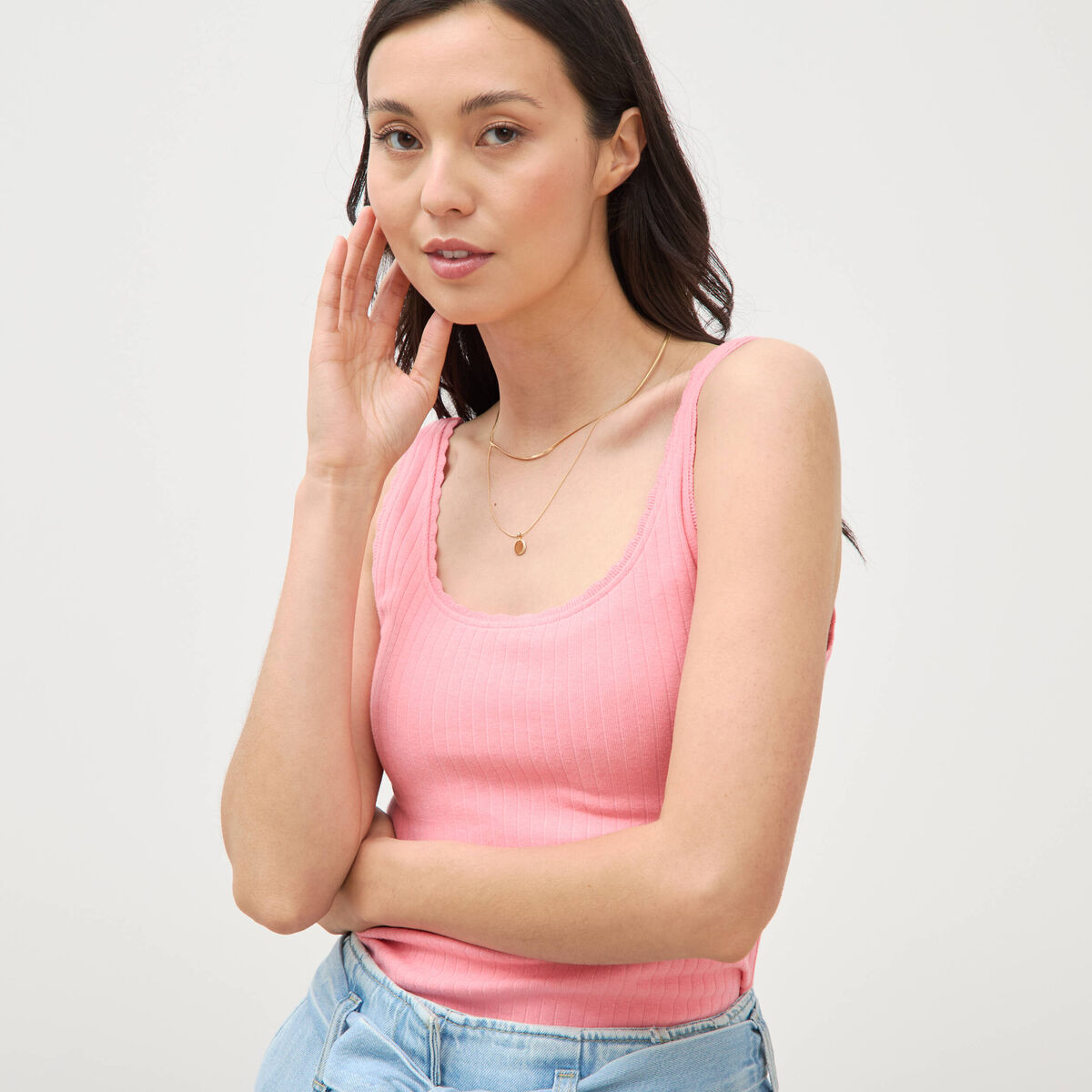 D&eacute;bardeur sans manches c&ocirc;tel&eacute; rose femme