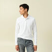 Polo cintr&eacute; manches longues en coton blanc homme
