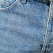 Jeans large longueur 34 en coton denim bleach homme