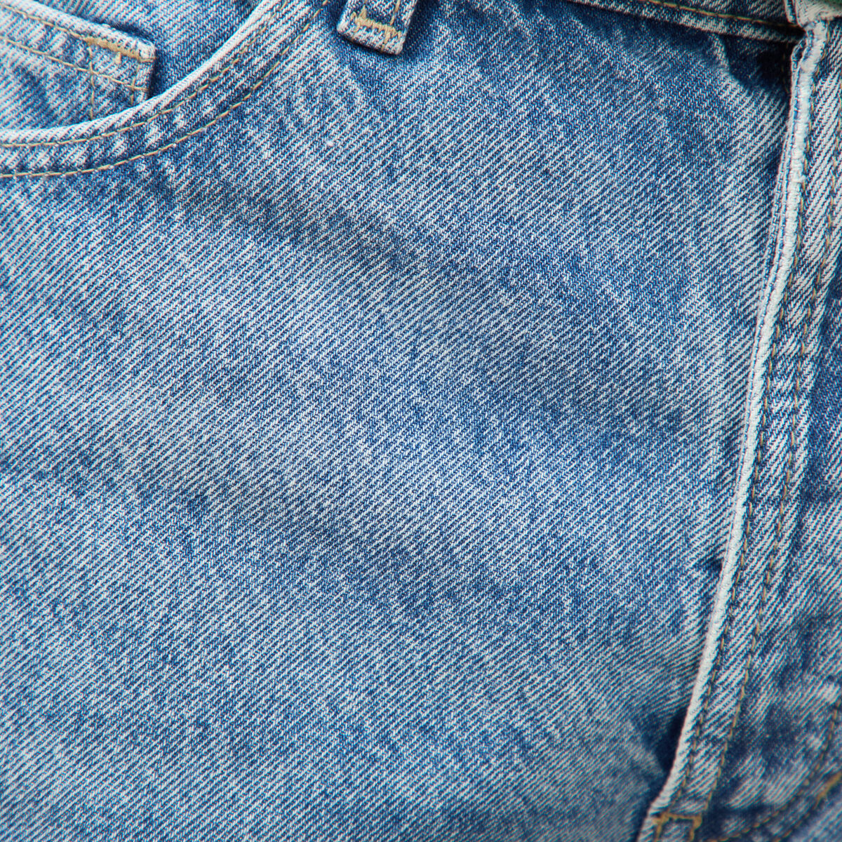 Jeans large longueur 34 en coton denim bleach homme