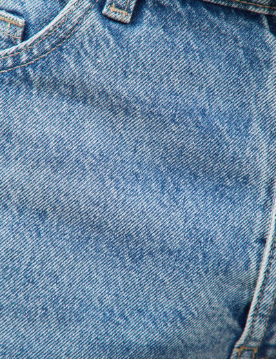 Jeans large longueur 34 en coton denim bleach homme
