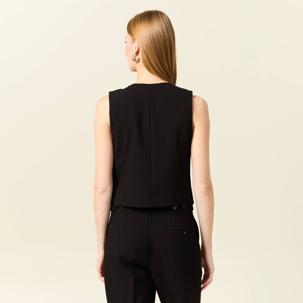 veston sans manches ajuste noir femme Veston sans manches ajusté noir femme
