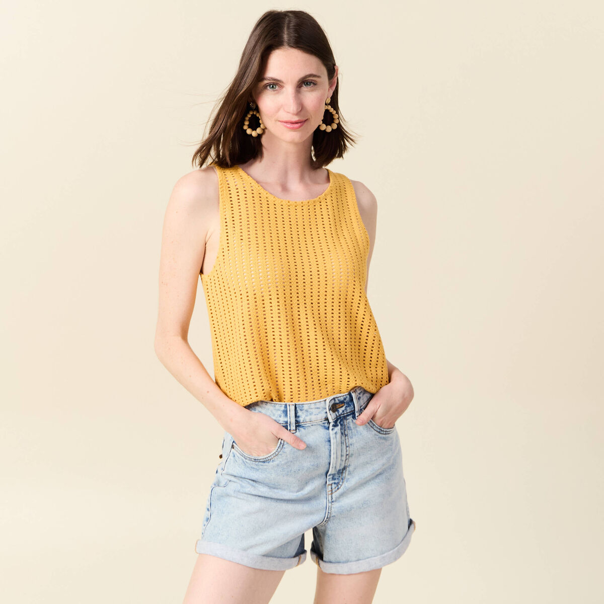 Débardeur sans manches ajouré jaune femme