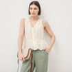 Top col v sans manches en coton creme femme