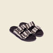 Mules plates avec boucles noir femme