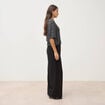 Pull manches courtes col rond brillant noir femme