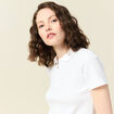 Polo zippé manches courtes blanc femme