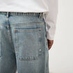 Jeans loose longueur 32 en coton denim dirty homme