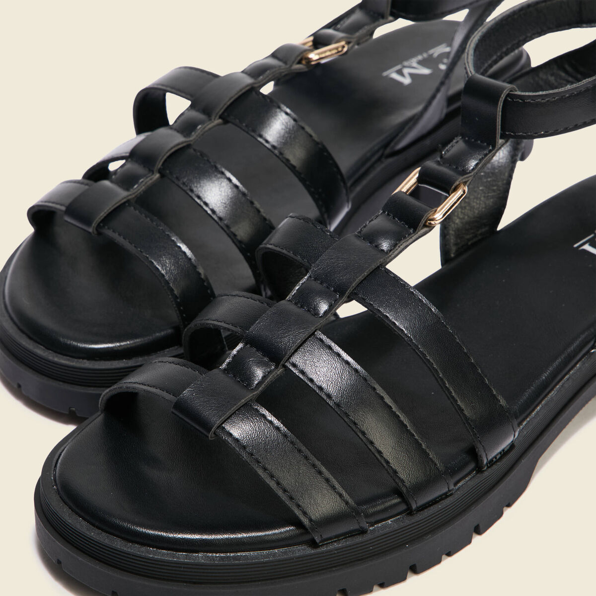 Sandales crantées noir femme