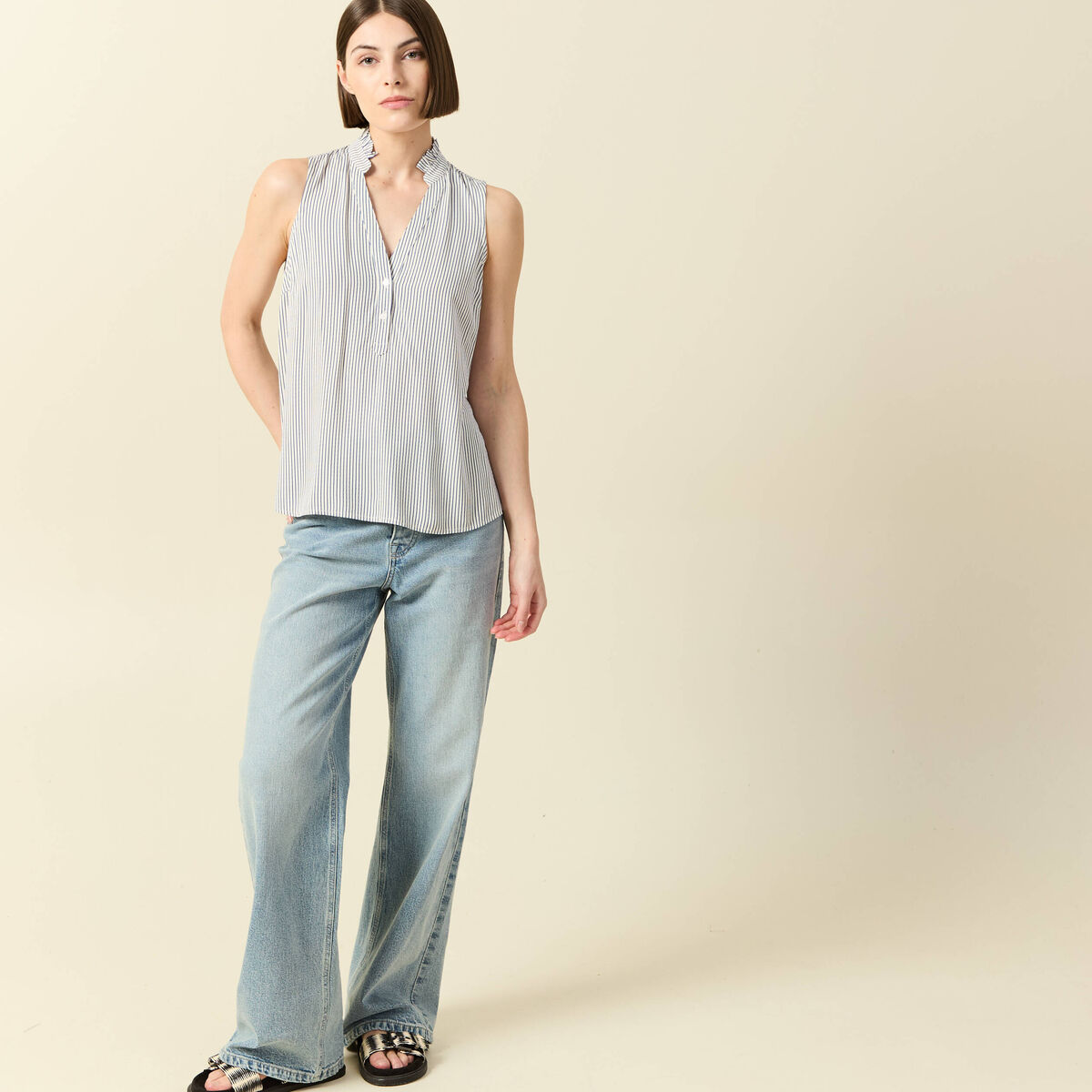 Top sans manches col montant bleu femme