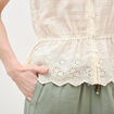 Top col v sans manches en coton creme femme