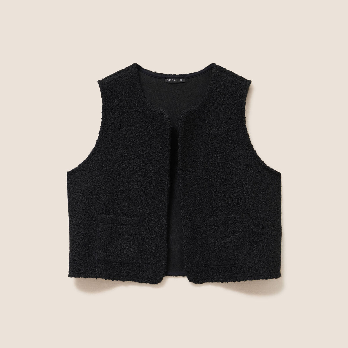 Gilet sans manches bouclette poches noir femme