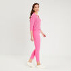 Pantalon ajusté rose fushia femme