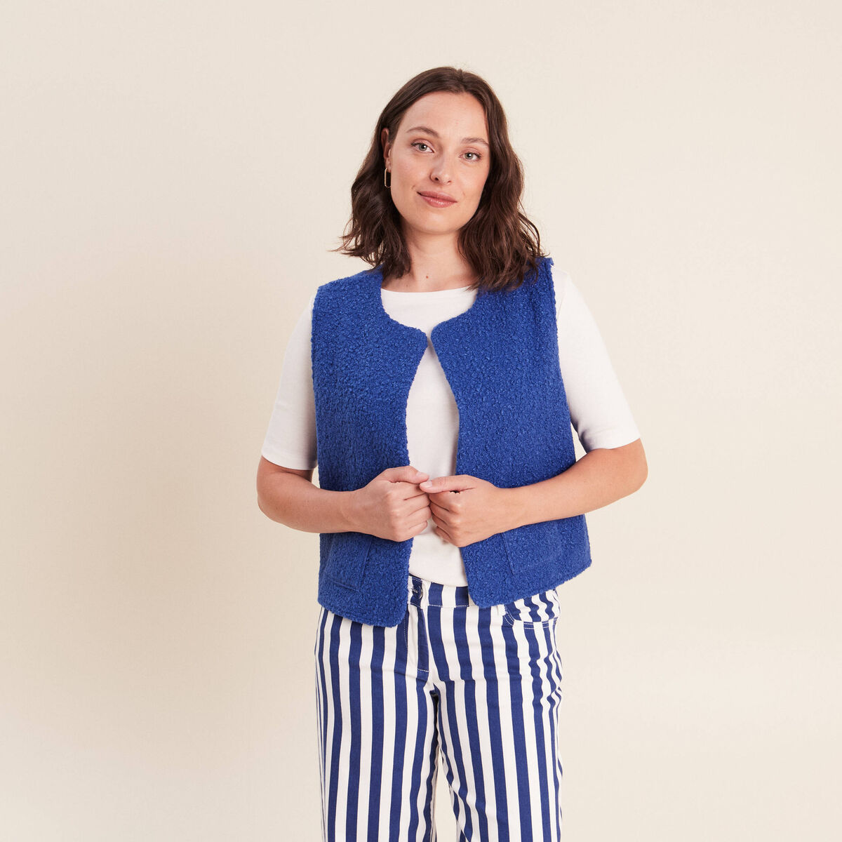 Gilet sans manches bouclette poches bleu fonc&eacute; femme