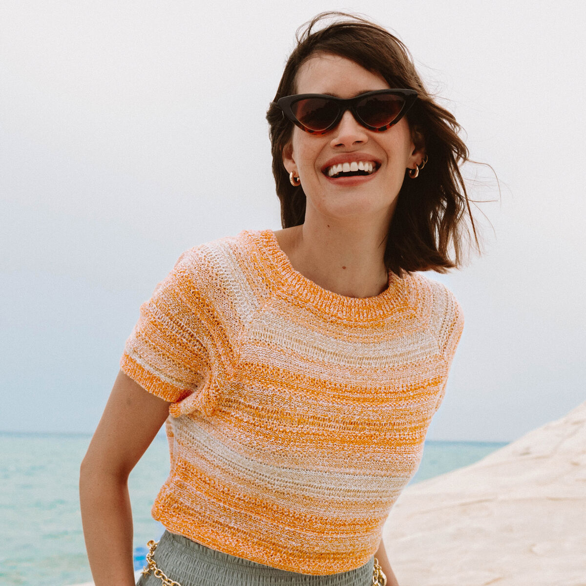 Pull col v manches courtes orange fluo femme
