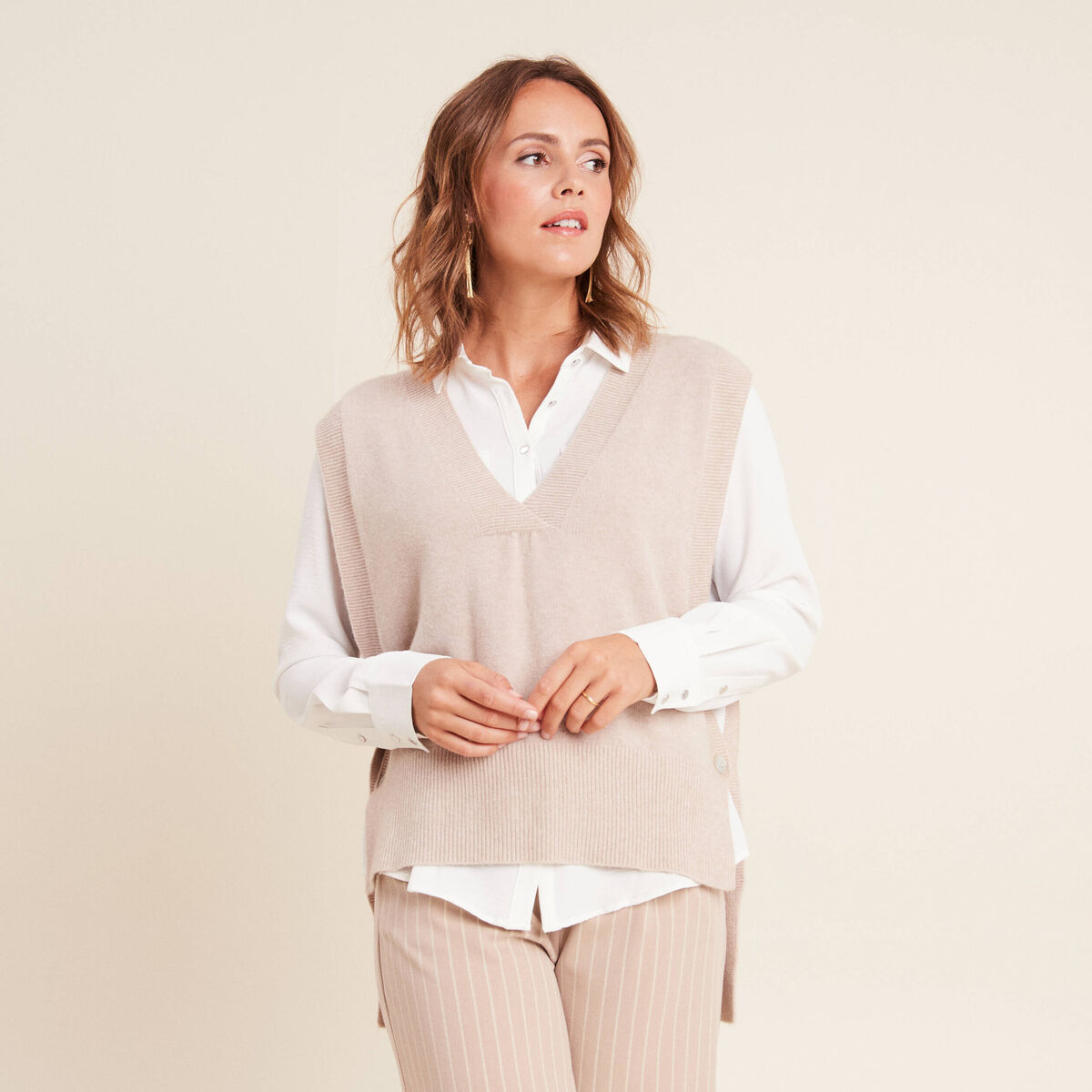 Pull sans manches creme femme