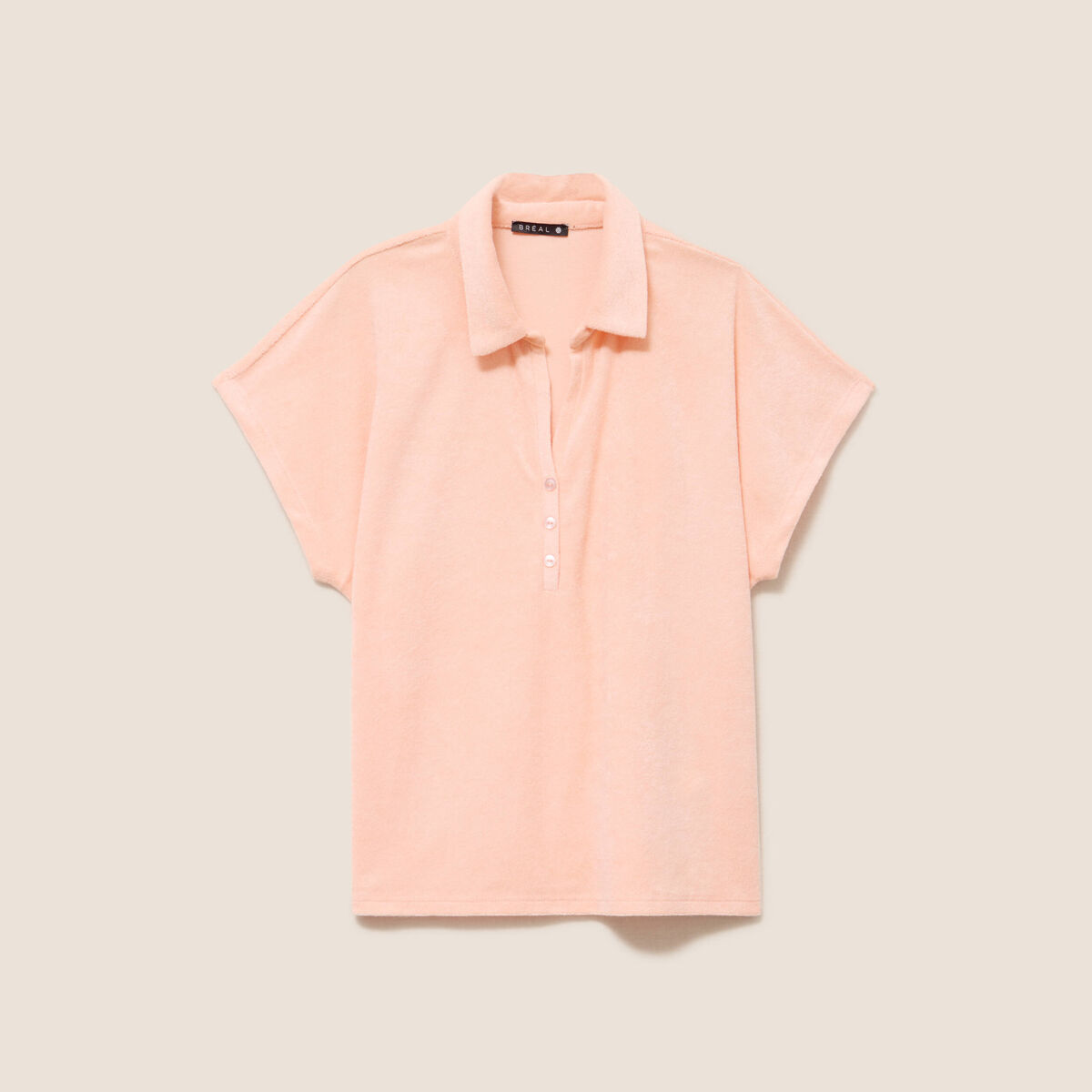 Polo droit col chemise manches courtes orange abricot femme