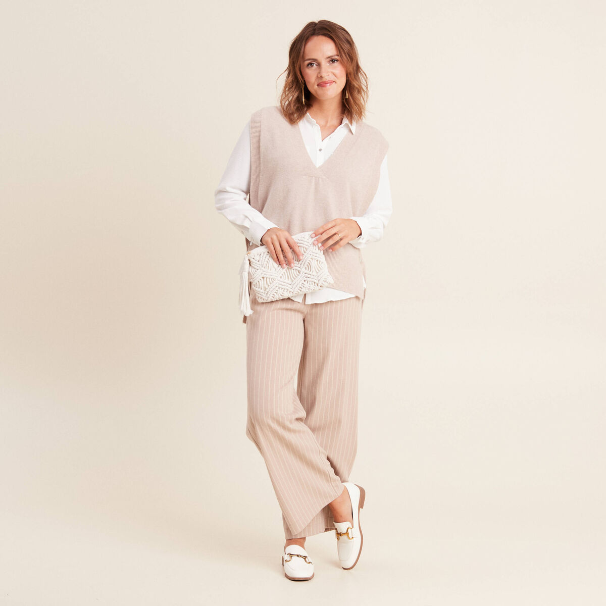 Pull sans manches creme femme